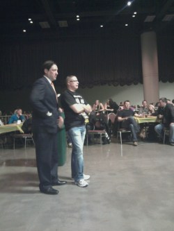 Promoter Tony G is in the jeans with one of his partner's waiting for the main event.